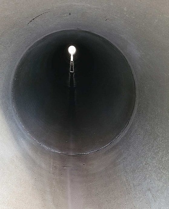Newly Cleaned Concrete Culvert Pipe — Providing Excavation & Drain Services in Landsborough, QLD